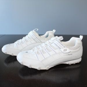 Sketchers Kids White and Silver Sneakers
